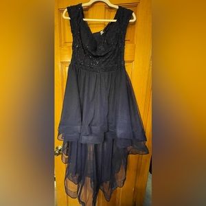 Navy homecoming dress, off the shoulder and shorter in front longer in back.